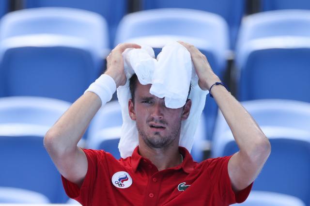 球探比分官网-日媒：奥组委应对高温太迟缓 桃田贤斗失利很意外